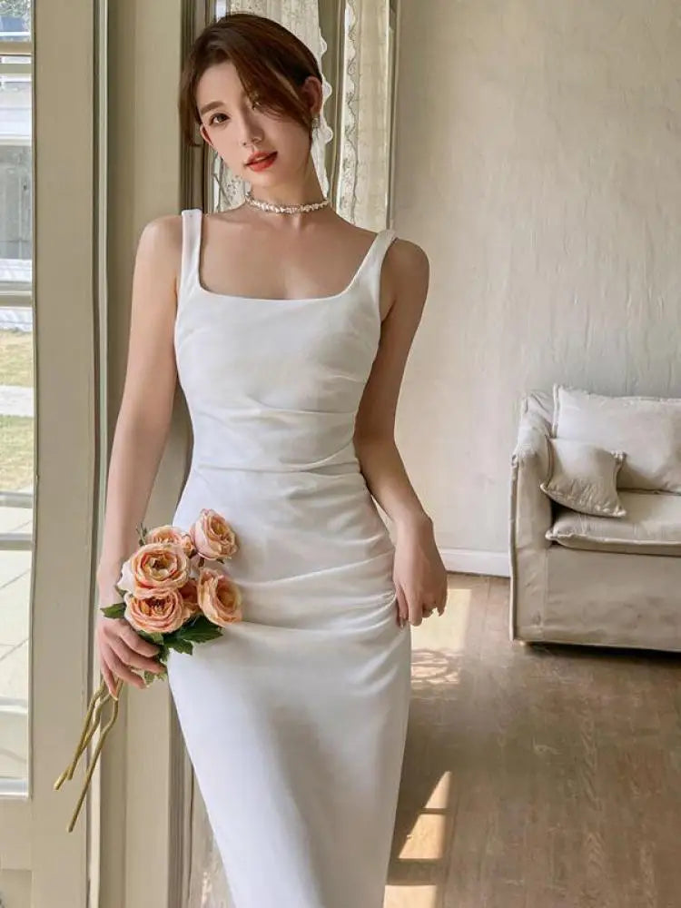 Sleeveless White Midi Dress with Square