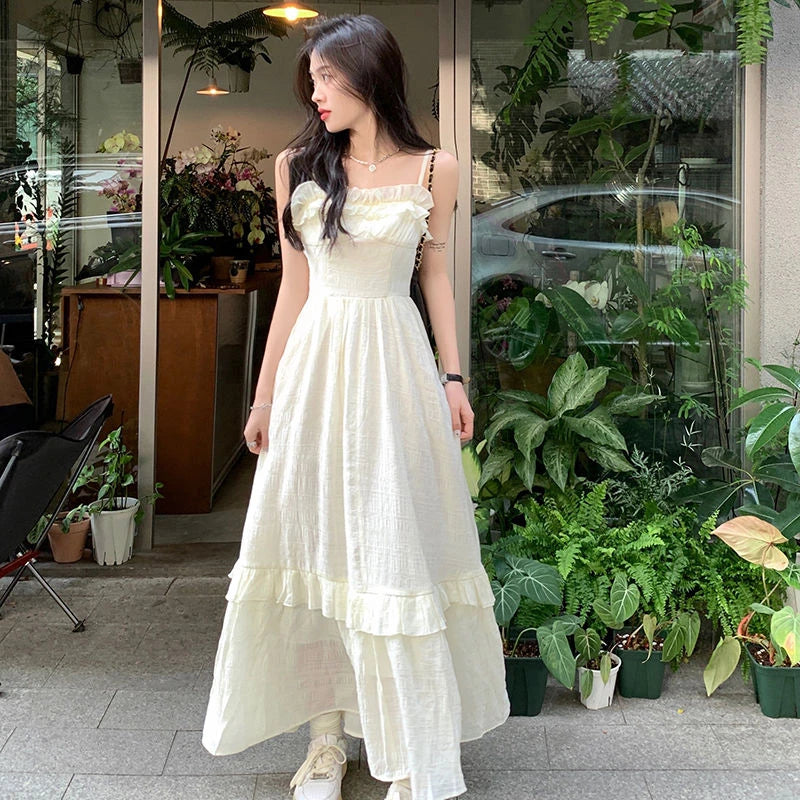 Sleeveless Long White Dress with Ruffle Hem